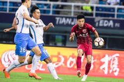 爱游戏娱乐-上海上港奋力逆转，喜获三分